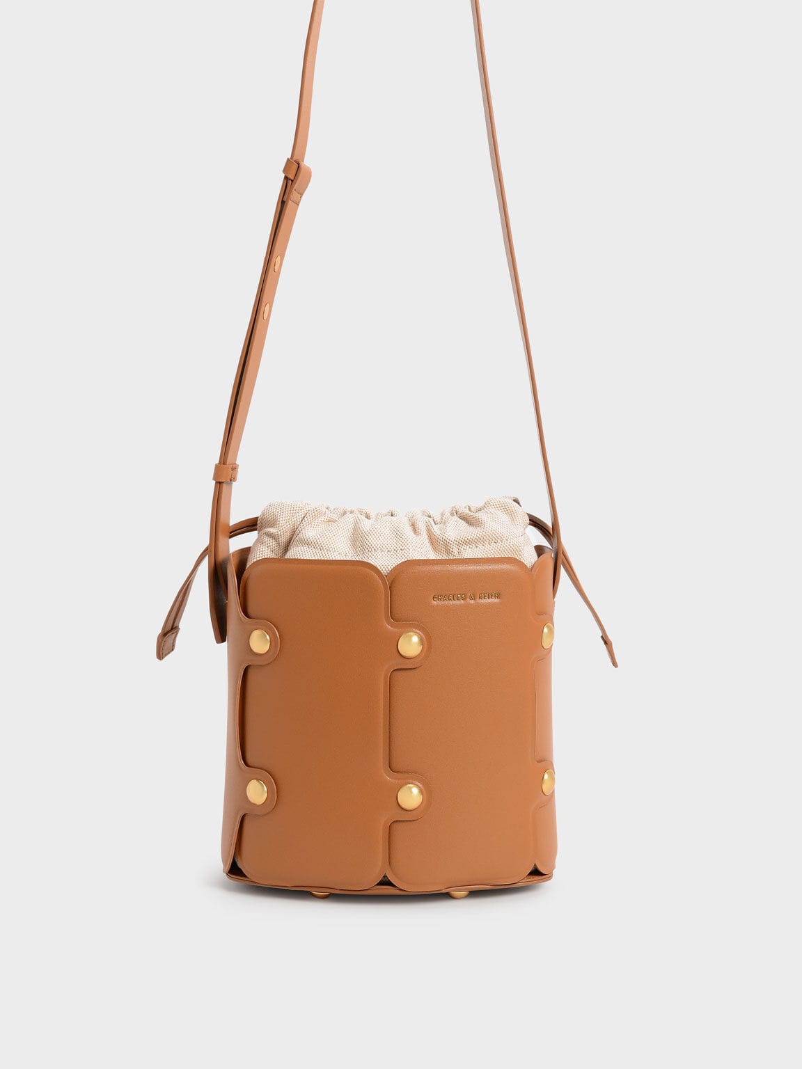 Charles Keith Studded Drawstring Bucket Bag Cognac MERRIA